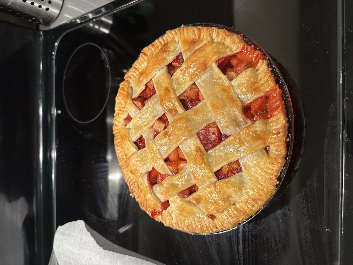 Strawberry rhubarb pie with a golden lattice crust