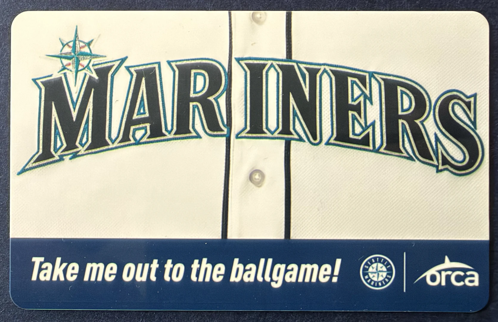 ORCA transit card styled as a white Seattle Mariners jersey